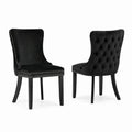Sedia in velluto nero con struttura in legno